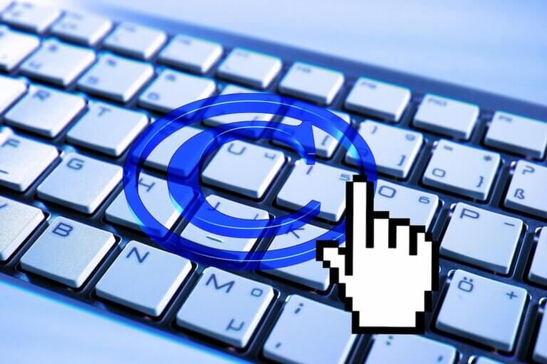 A copyright symbol superimposed over a keyboard.