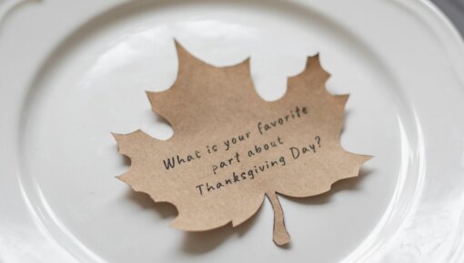 A leaf on a plate with the writing, 