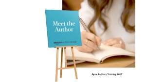 A sign that reads, "Meet the Author" in front of a woman writing in a notebook.
